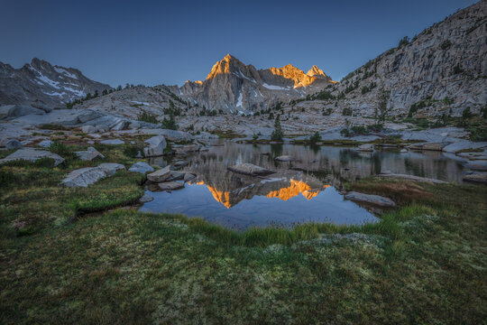 Early morning Picture Peak mountain reflections in Sailor Lake, Sierra Nevada Mountains, Inyo National Forest, California, USA