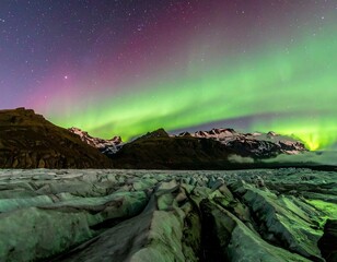 Nighttime aurora borealis over glacier