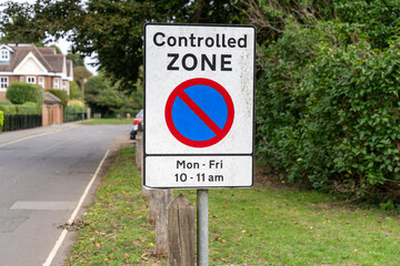 Controlled Zone No Parking Sign on Suburban Street
