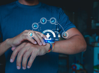 Close-up of a man using a smartwatch with digital data transfer and cloud connection icons. Concept of Internet of Things, wearable devices, and digital data security.