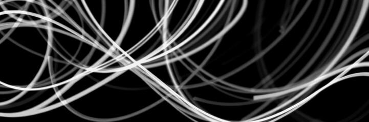 Abstract light trails create dynamic patterns