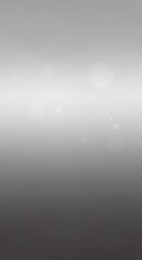 Soft Gray Bokeh Background with Gentle Light Effects for Abstract and Elegant Designs