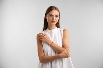 Fototapeta premium Portrait of beautiful woman on white background