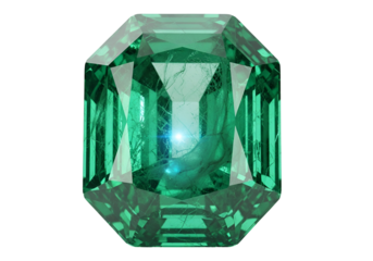 A radiant emerald gemstone, showcasing intricate facets and a rich green hue, set against a striking black backdrop.