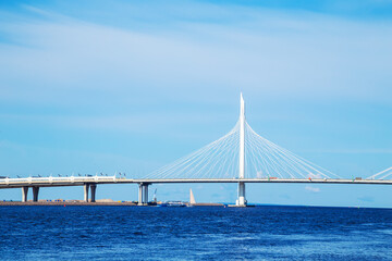 Cable-stayed automobile bridge across the Gulf of Finland. Summer sunny day.