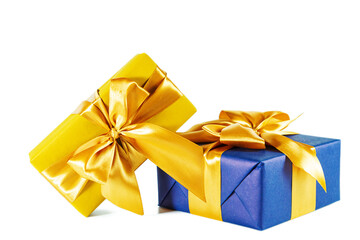 Elegant blue and gold gift boxes with bows isolated on white background.