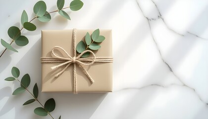 Gift Box With Natural Twine on Marble Surface Flat Lay