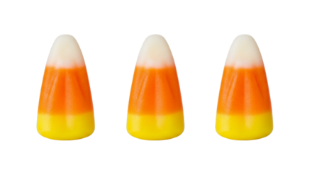 Three candy corn pieces isolated on white and transparent background, a sweet confectionery for autumn treat and holiday concepts