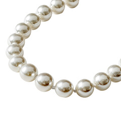 Obraz premium Close-up of a pearl necklace. A string of large, round, off-white pearls forms a curved line against a black background