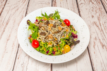 Tender shoot salad with canned tuna, green apple, celery, and walnuts, with a honey mustard vinaigrette