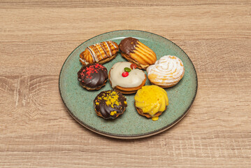  tea cakes with decorated gingerbread cookies, cinnamon stars, and almond shortbread dusted with powdered sugar