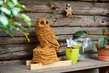 Wooden owl - decoration for the garden