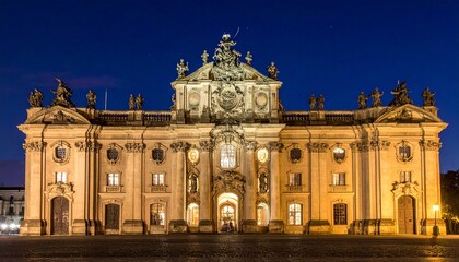 Obraz premium Illuminated Royal Palace Facade at Dusk with Dramatic Sky.