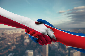 Shaking hands Poland and_Korea, North-2