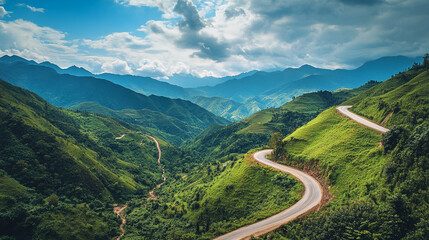 Fototapeta premium Winding Road Through Lush Green Mountains