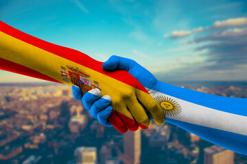 Shaking hands Spain and Argentina