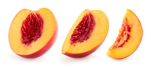 Peach and slice in closeup isolated on white background