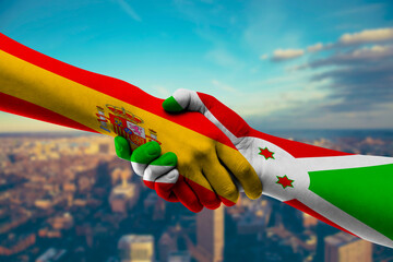 Shaking hands Spain and Burundi