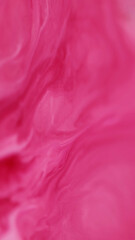 Fototapeta premium Ink stains. Blend flow. Defocused pink colorful water marble particles chemical flood texture floating on abstract art background.