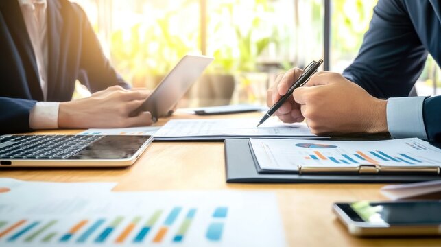 Business meeting analyzing financial data