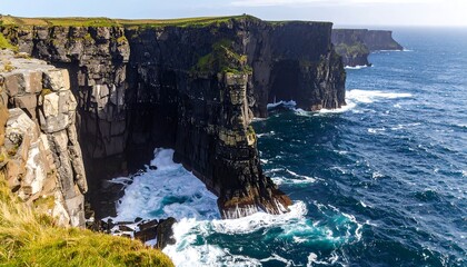 Dramatic cliffs meet churning sea