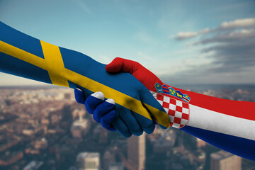 Shaking hands Sweden and Croatia