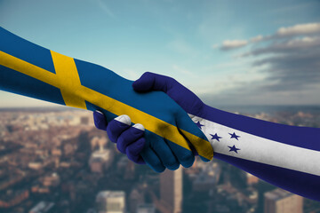 Shaking hands Sweden and Honduras-2