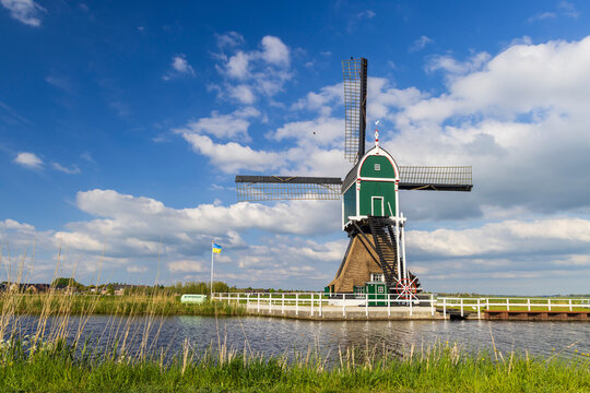 Traditional Dutch Windmill Standing Tall in Groot Ammers, Netherlands
