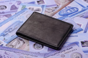 UAE money, dirhams, cash arabic banknotes for financial and business processes. Emirates cash