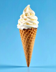 Sweet Vanilla Ice Cream Cone with Crunchy Waffle Isolated on Blue Background for Dessert Object, Summer Food and Refreshing Snack Concept