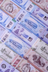 UAE money, dirhams, cash arabic banknotes for financial and business processes. Emirates cash