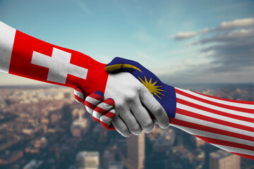 Shaking hands Switzerland and_Malaysia