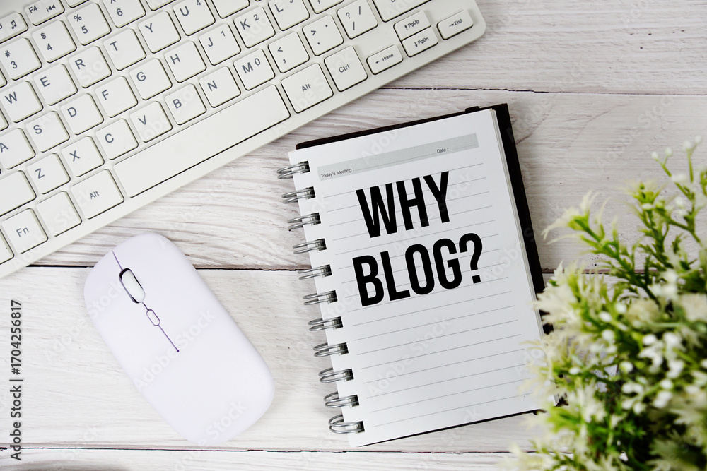 Poster why blog? text with keyboard and wireless mouse on wooden background