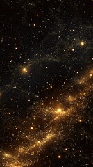 Obraz premium Golden glitter sparkles on a dark background create a magical and festive atmosphere