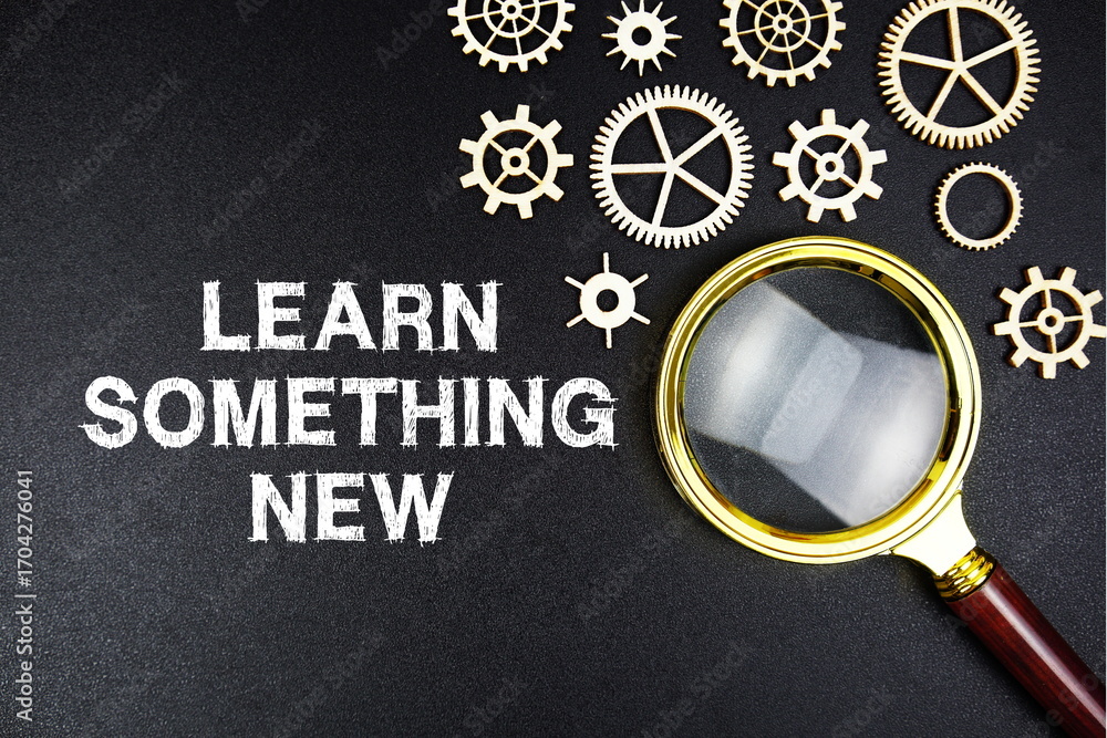 Poster learn something new text message with magnifying glass on black background