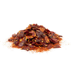 Obraz premium Close up spicy chili red pepper flakes, chopped, milled dry paprika pile isolated on white.png