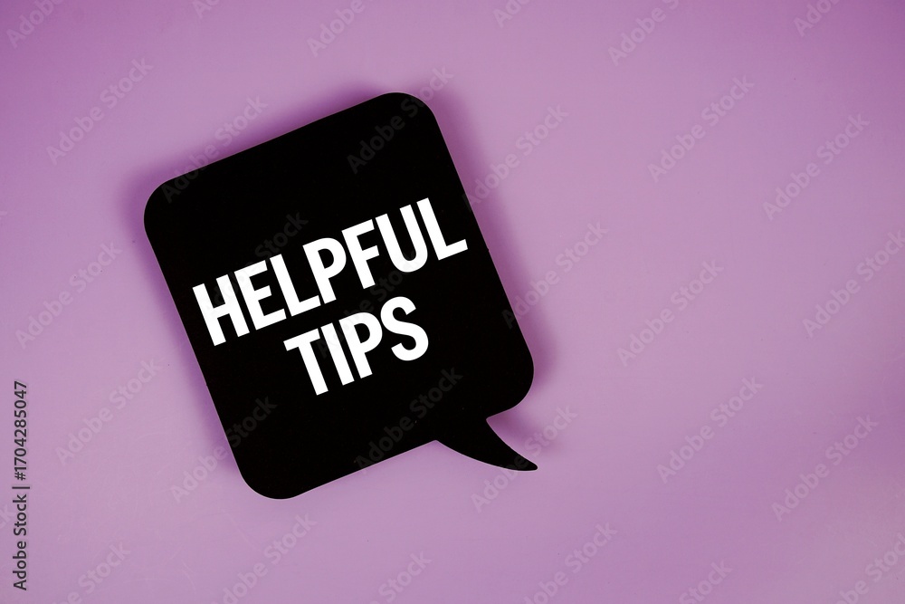 Aufkleber helpful tips text with speech bubble top view on purple background