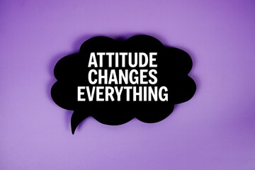 Attitude Changes Everything text with speech bubble top view on purple background