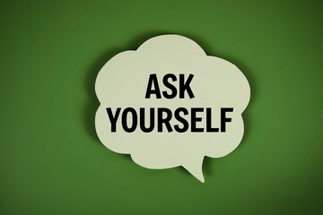 Ask Yourself text with speech bubble top view on green background