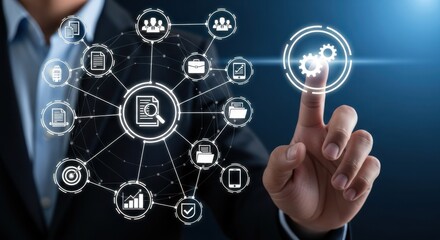 Businessman interacting with a digital network of business and finance icons on a dark background
