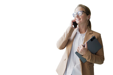 Young professional woman conversing on cellphone while holding a tablet