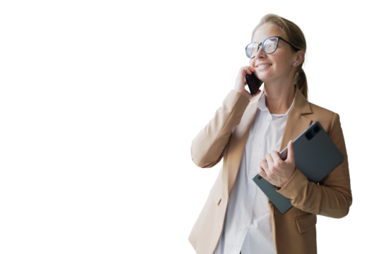 Young professional woman conversing on cellphone while holding a tablet