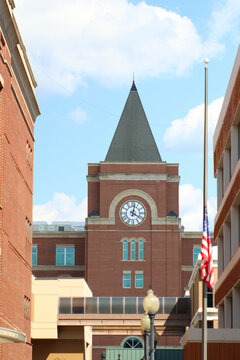 Cobb county court house. Photo of clock in green steeple. The first courthouse was built in 1834 and was located in Marietta. It was a mere one-room log structure. Photo taken 8 24 2025 in Marietta GA