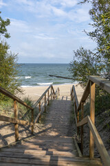 wooden stairs leading to the baltic sea	