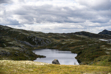 Serene Mountain Lake in the Wild Norwegian Highlands