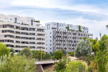 Modern Buildings Rising Above Green