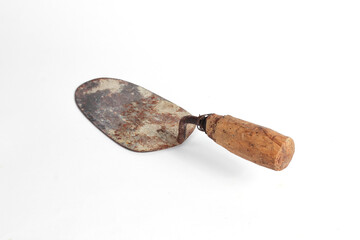 rusty construction tools trowel isolated on white background