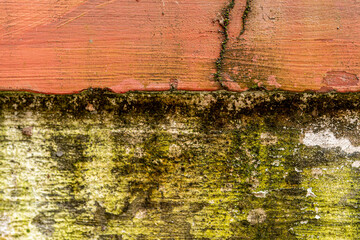 old brick wall with peeling paint