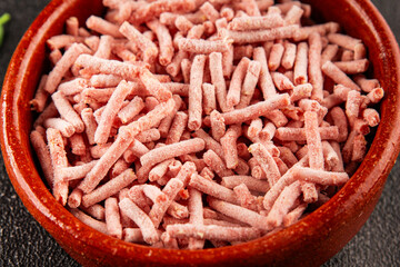 Minced meat frozen ground meat frozen pork, beef or chicken tasty snack fresh delicious gourmet food background on the table rustic food top view copy space