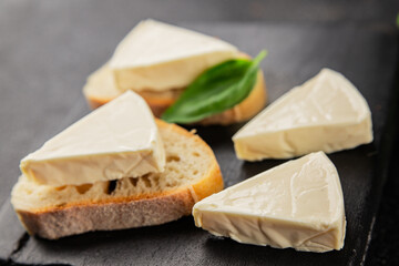 Processed cheese spread portion size cheese for sandwich tasty snack fresh delicious gourmet food background on the table rustic food top view copy space